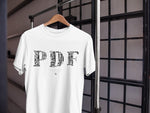 Load image into Gallery viewer, DAWN Myanmar PDF T-shirt Design on hanger

